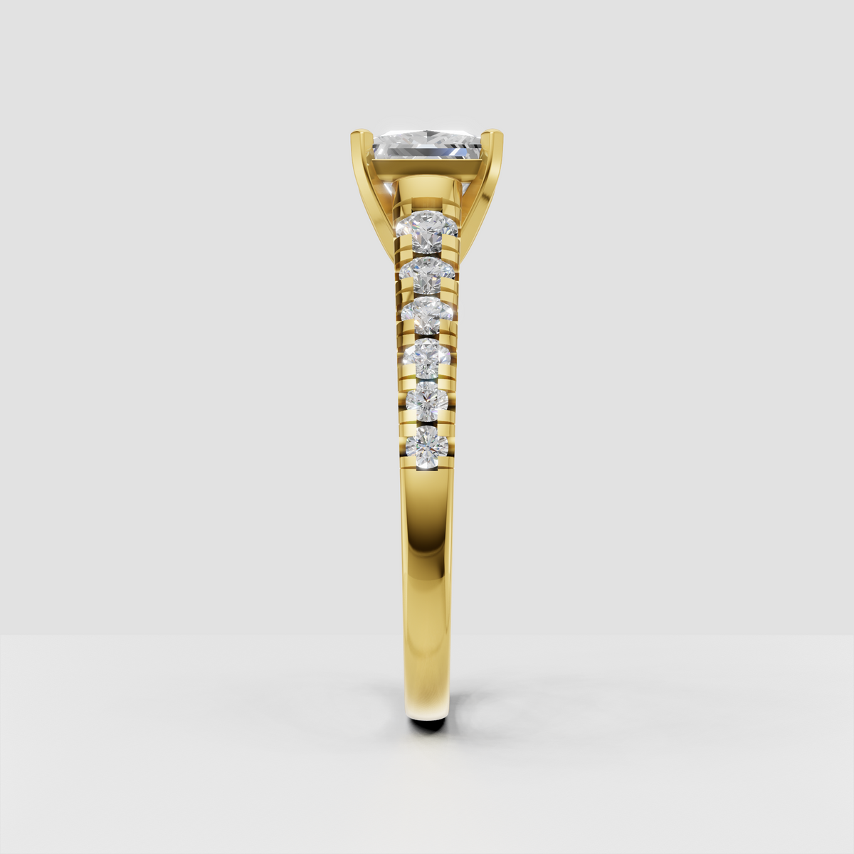 Four prong princess cut diamond ring in yellow gold