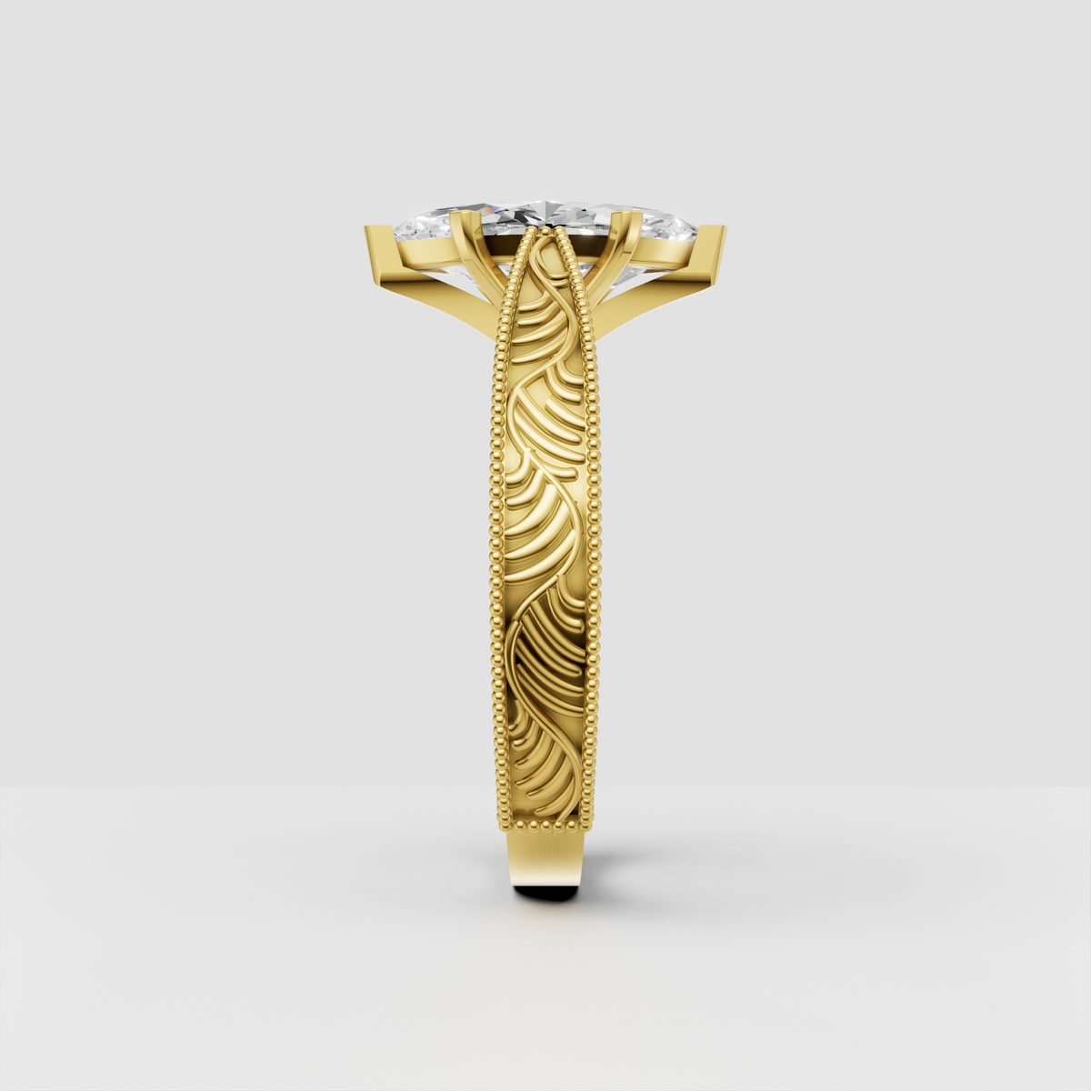 Vintage marquise diamond ring with intricate yellow gold detailing