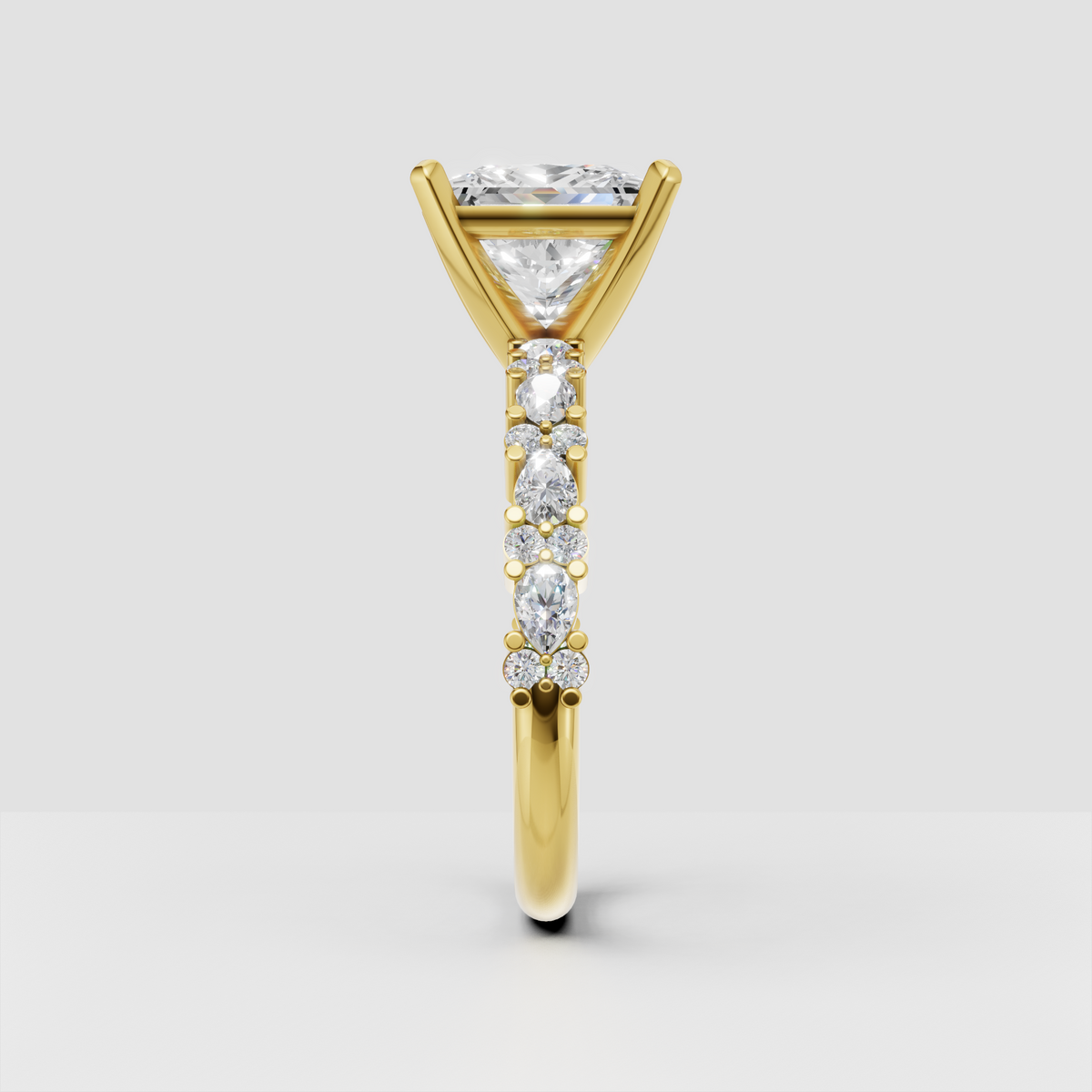 Square princess cut diamond four-prong ring in polished yellow gold