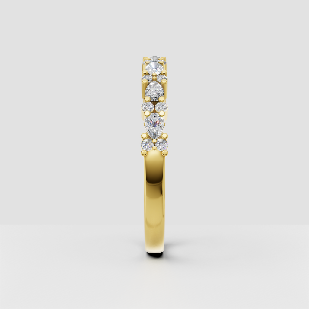 Half eternity diamond ring with floral-inspired round and marquise stone arrangement