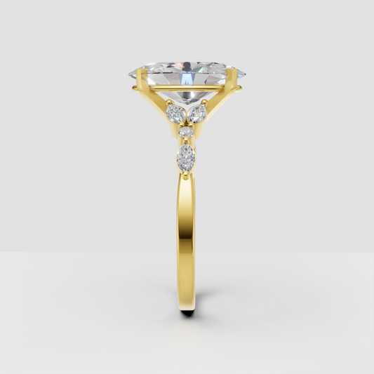 Yellow gold oval diamond engagement ring with four prongs