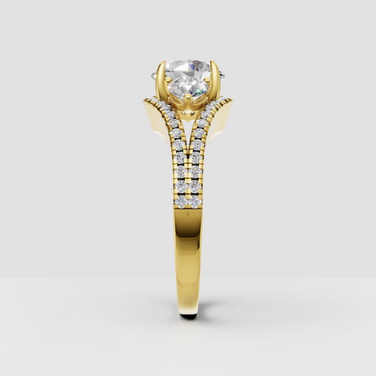Round diamond engagement ring with split shank and side stones