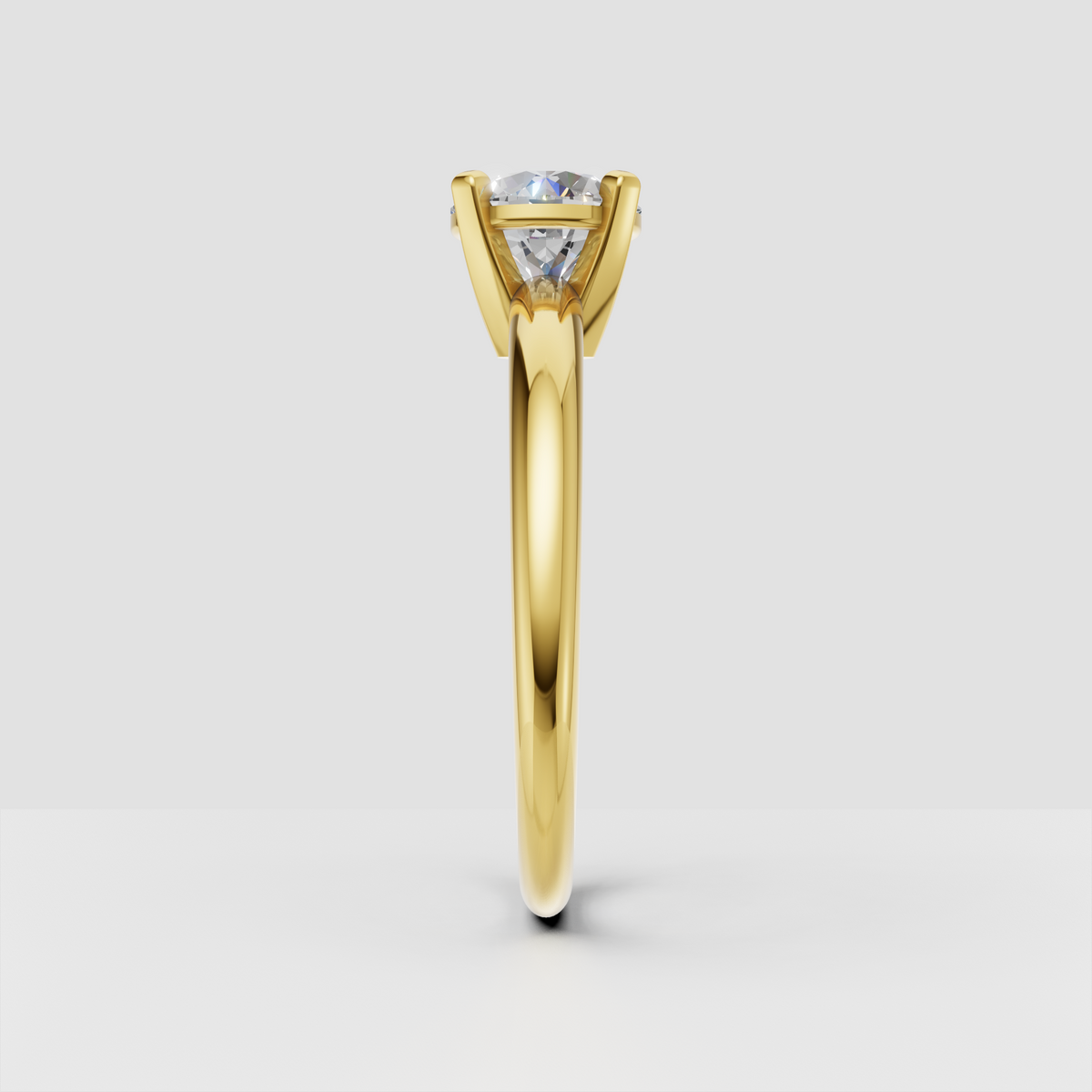 Yellow gold round cut diamond engagement ring with solitaire setting