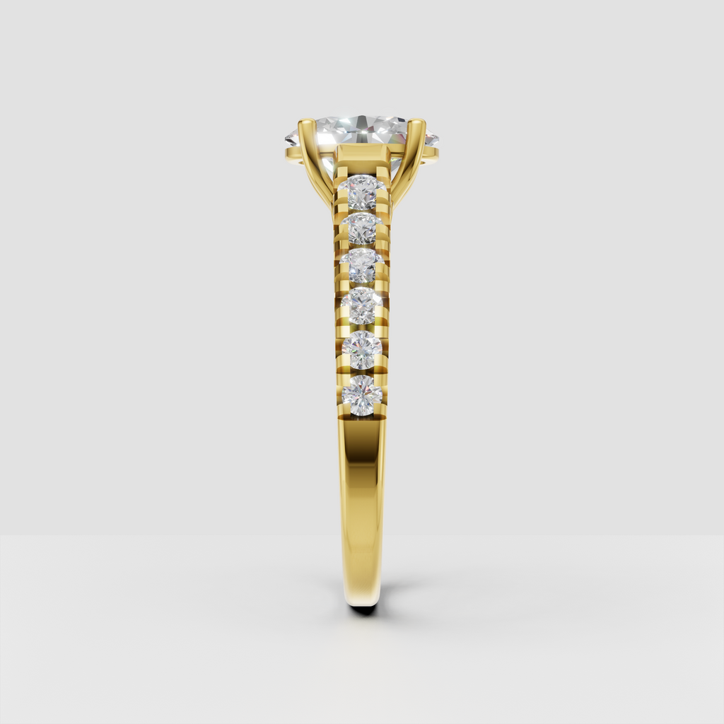 Yellow gold oval solitaire ring with sparkling accent diamonds