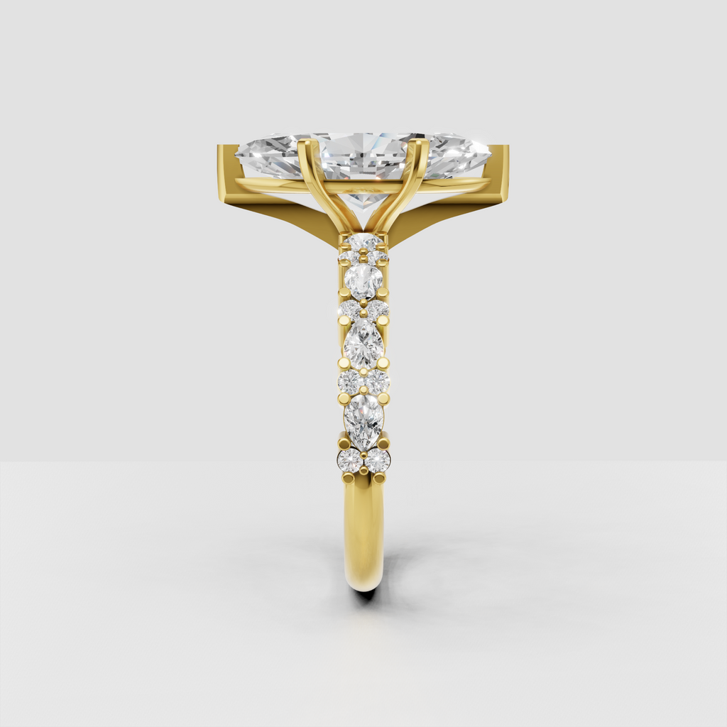 Yellow gold marquise diamond ring with four-prong center setting