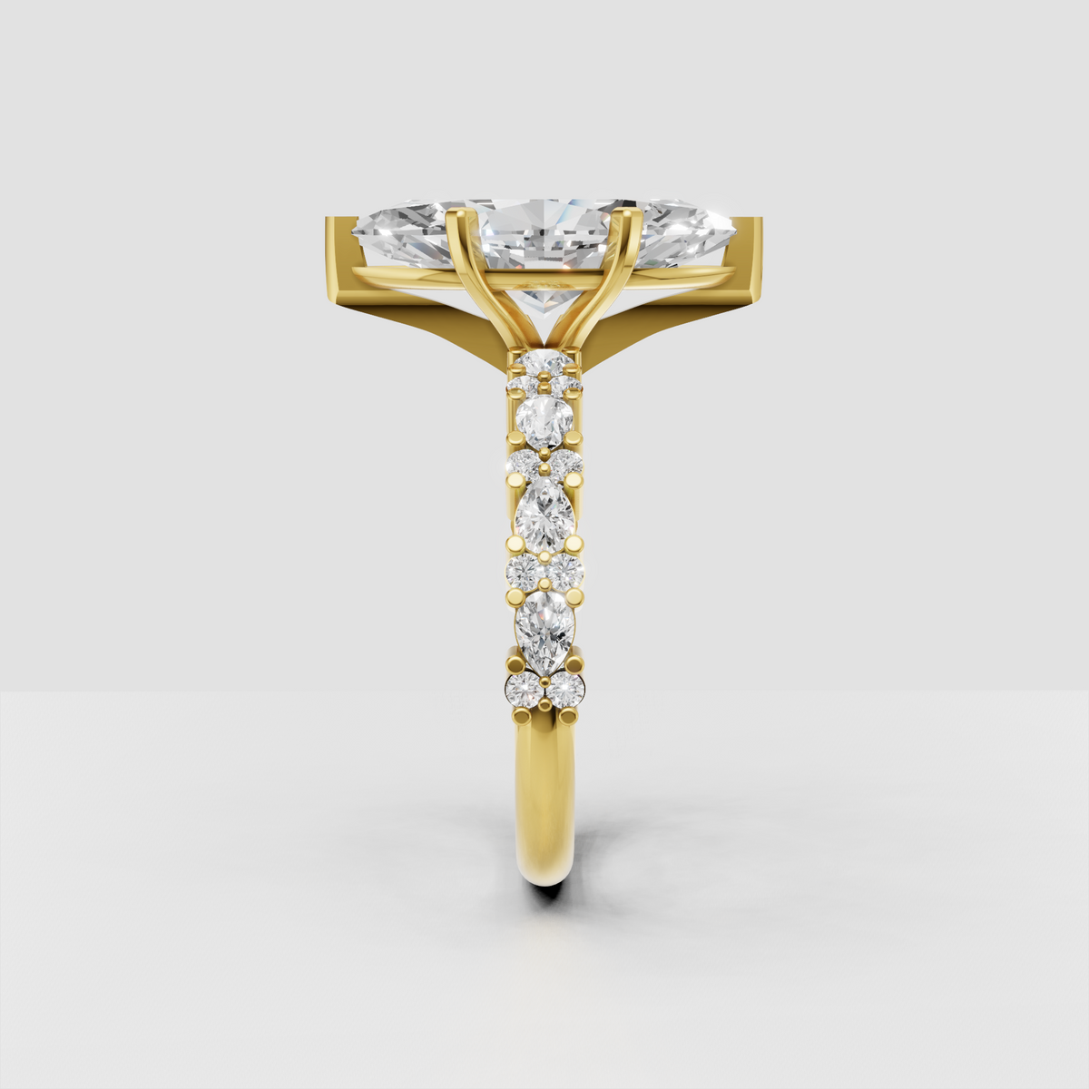 Yellow gold marquise diamond ring with four-prong center setting