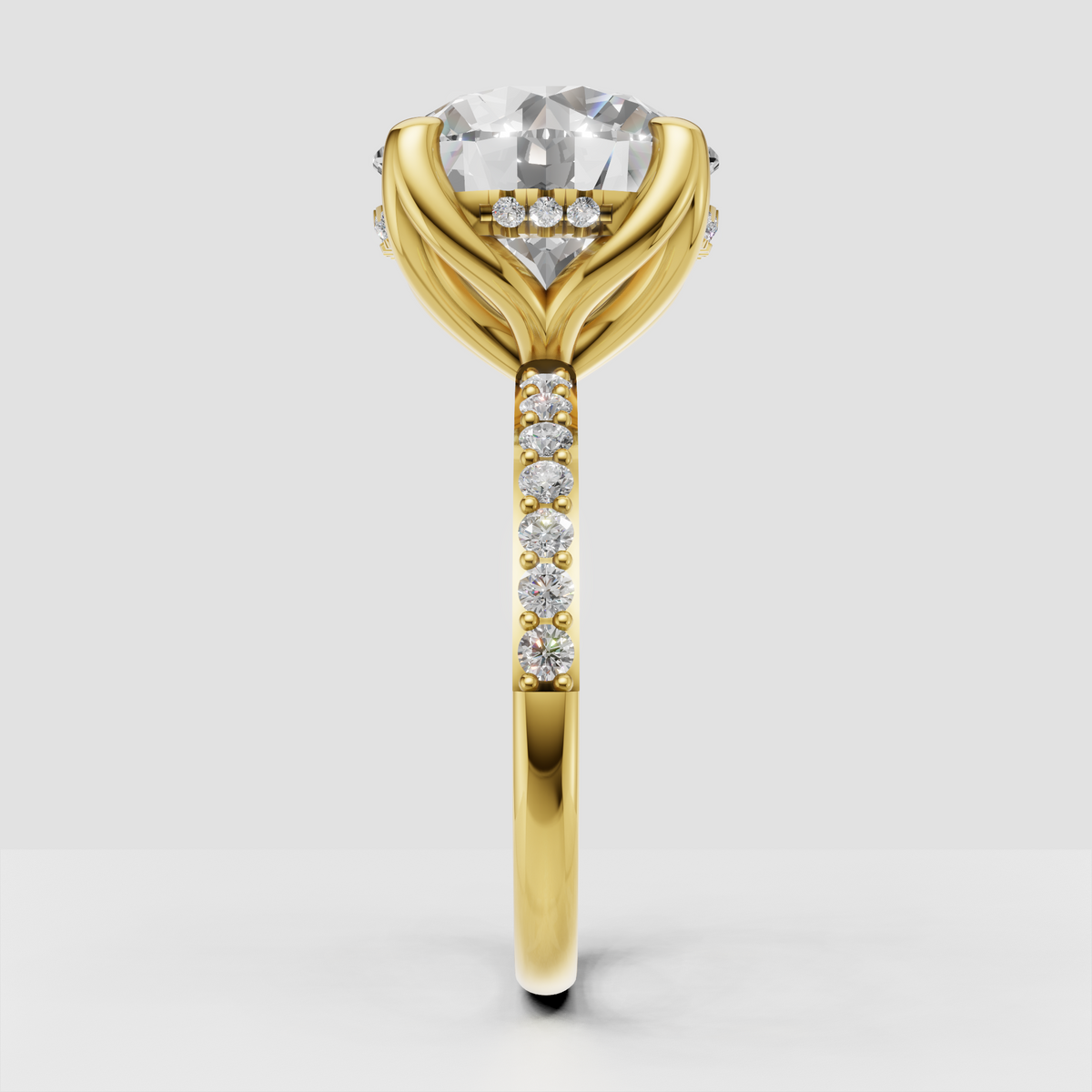 Yellow gold round diamond ring with sculpted split shoulders