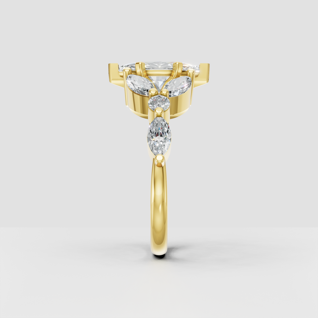 Nature-inspired marquise diamond ring in polished yellow gold
