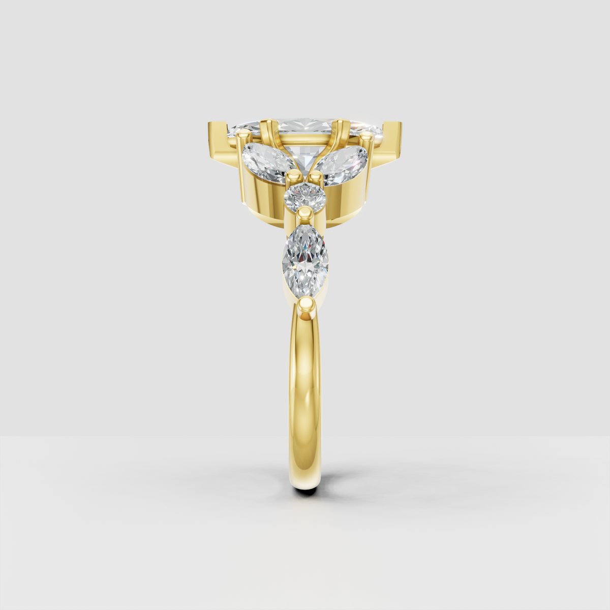 Nature-inspired marquise diamond ring in polished yellow gold