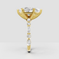 Yellow gold pear cut engagement ring with marquise accents