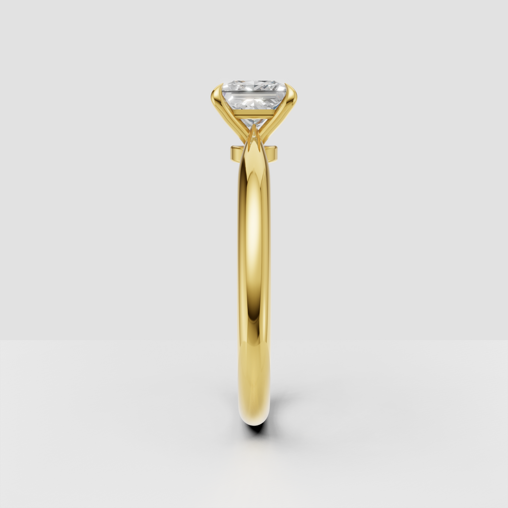 Yellow gold princess cut engagement ring with four-prong setting