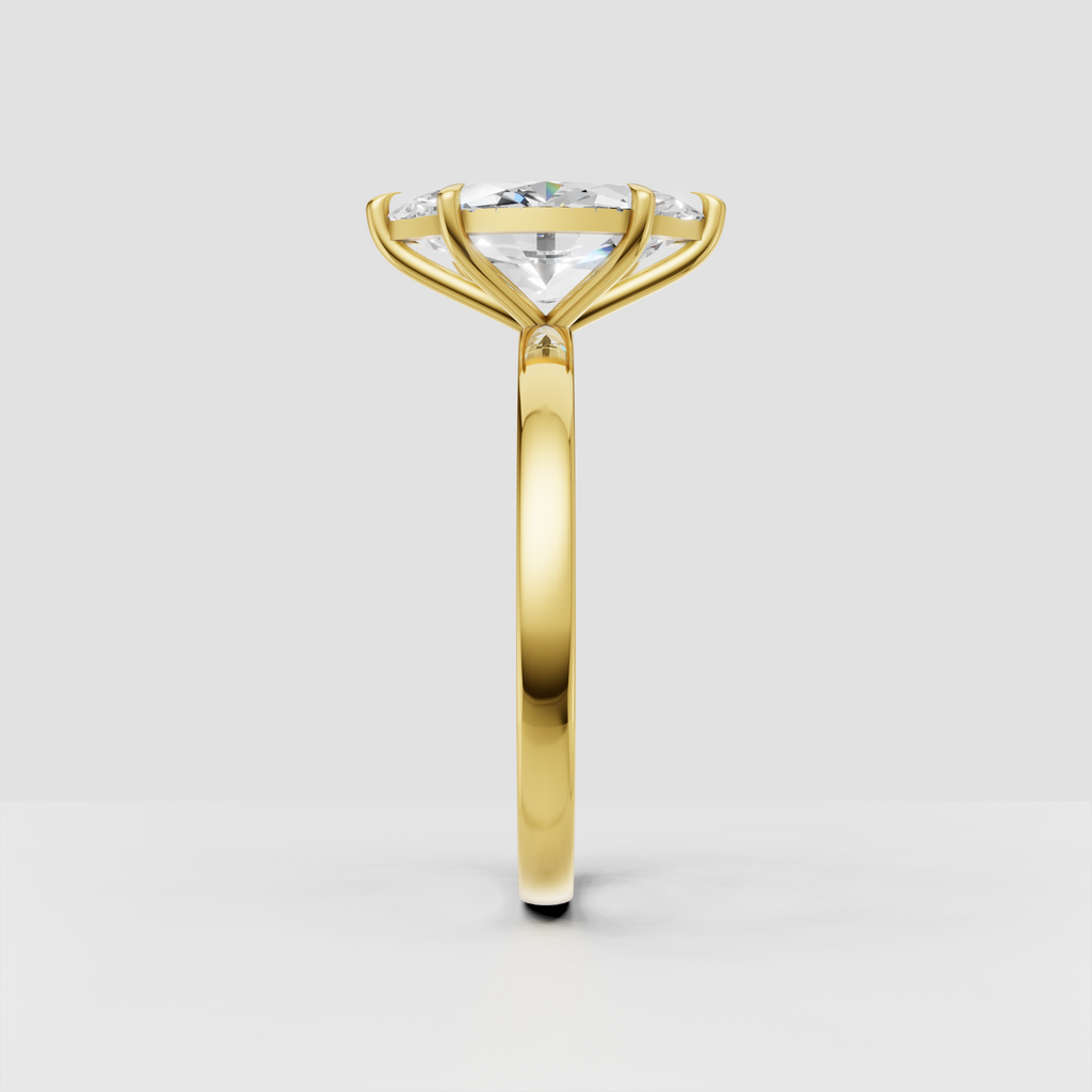 Yellow gold marquise solitaire ring with elongated center stone
