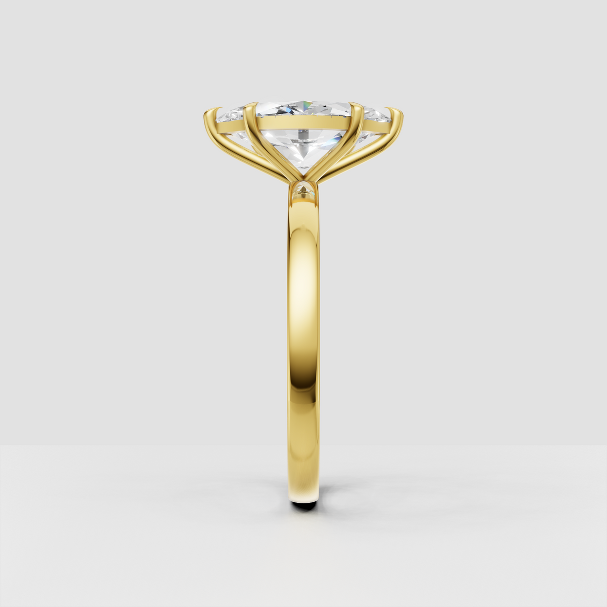 Yellow gold marquise solitaire ring with elongated center stone