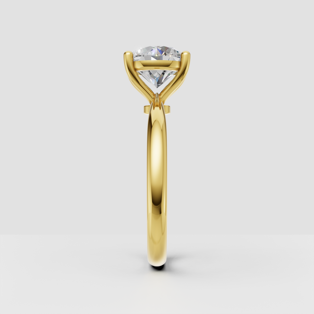 Round brilliant diamond ring featuring elegant four-prong gold setting