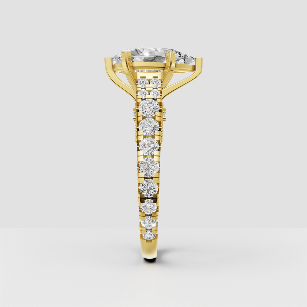 Yellow gold pear diamond ring with six-prong center setting
