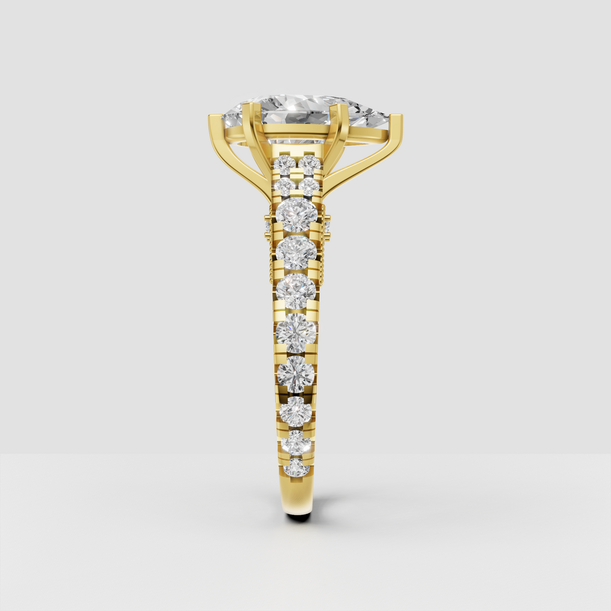 Yellow gold pear diamond ring with six-prong center setting