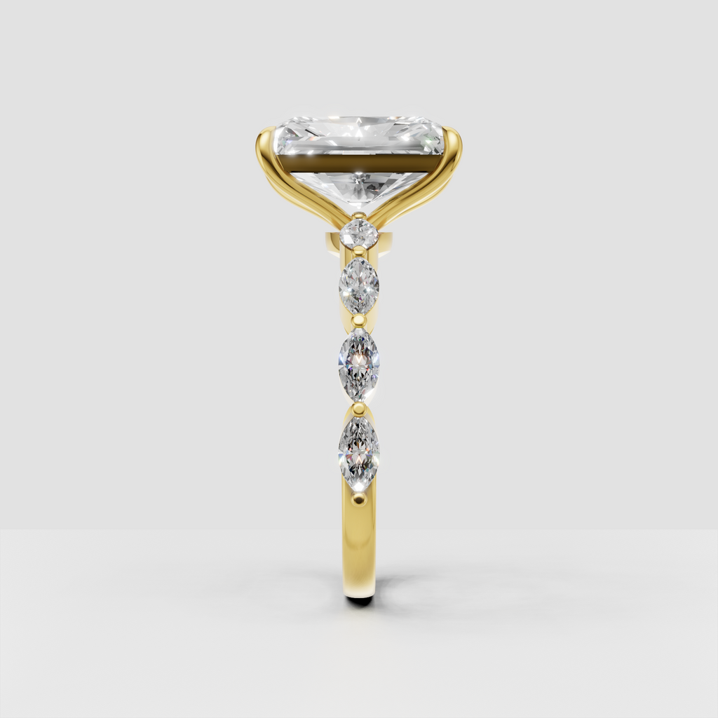 Yellow gold radiant diamond engagement ring with four prongs
