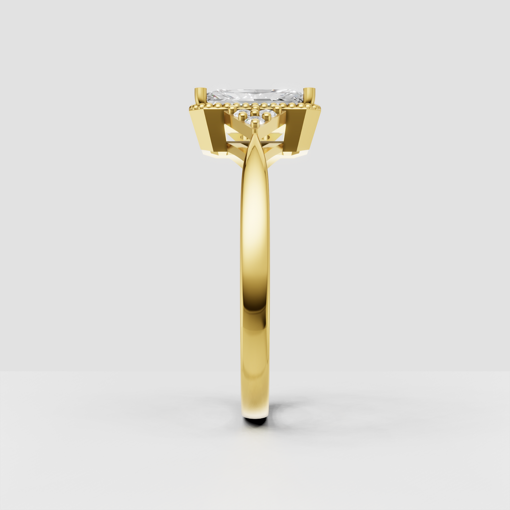 Yellow gold Radiant cut engagement ring with round side stone clusters