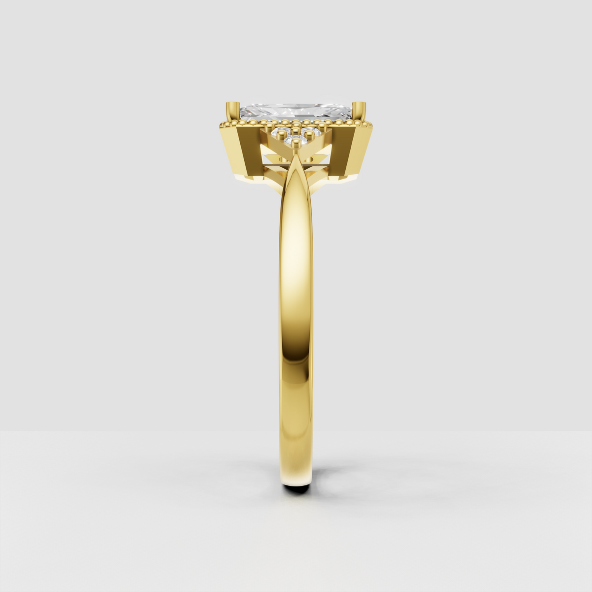 Yellow gold Radiant cut engagement ring with round side stone clusters
