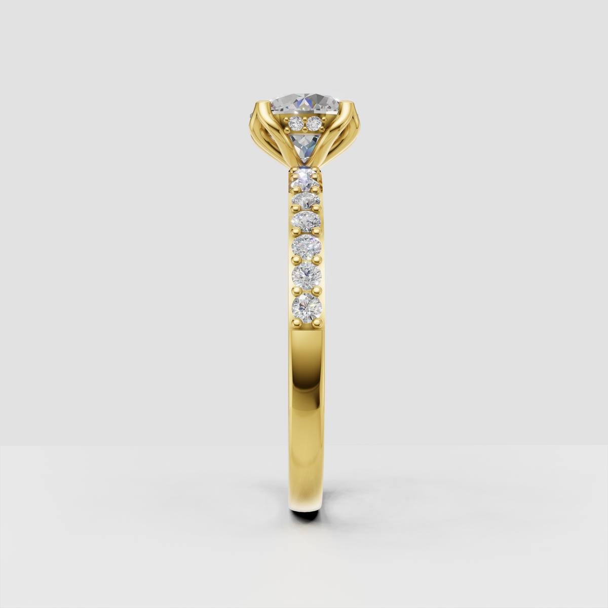 Round cut center diamond four prong engagement ring