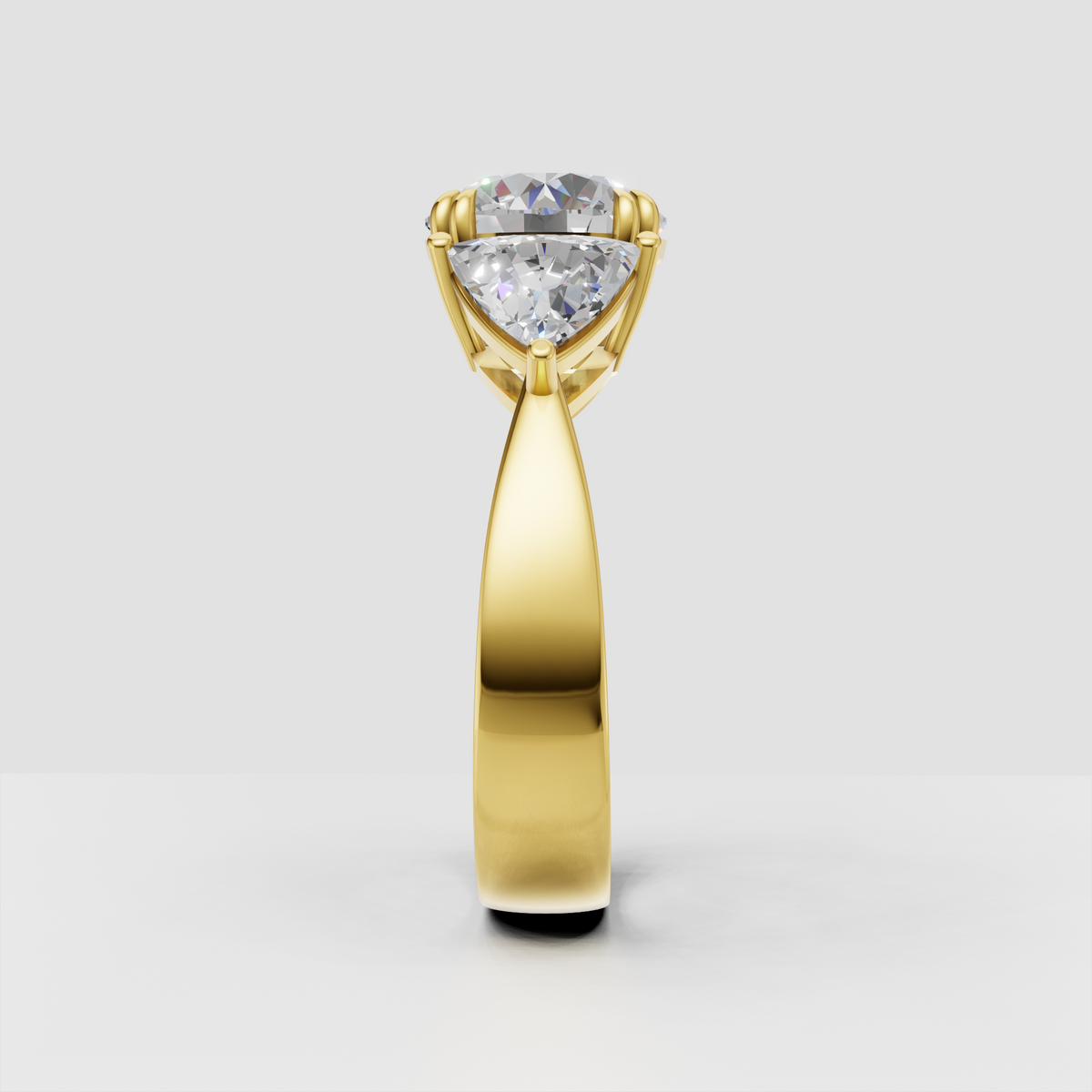 Three-stone round diamond engagement ring with elegant Trillion accents