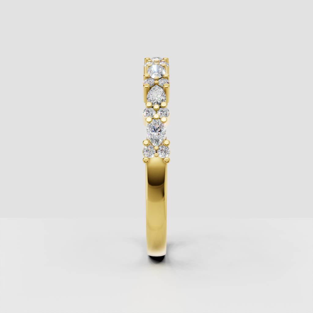Pear shaped diamond half eternity ring