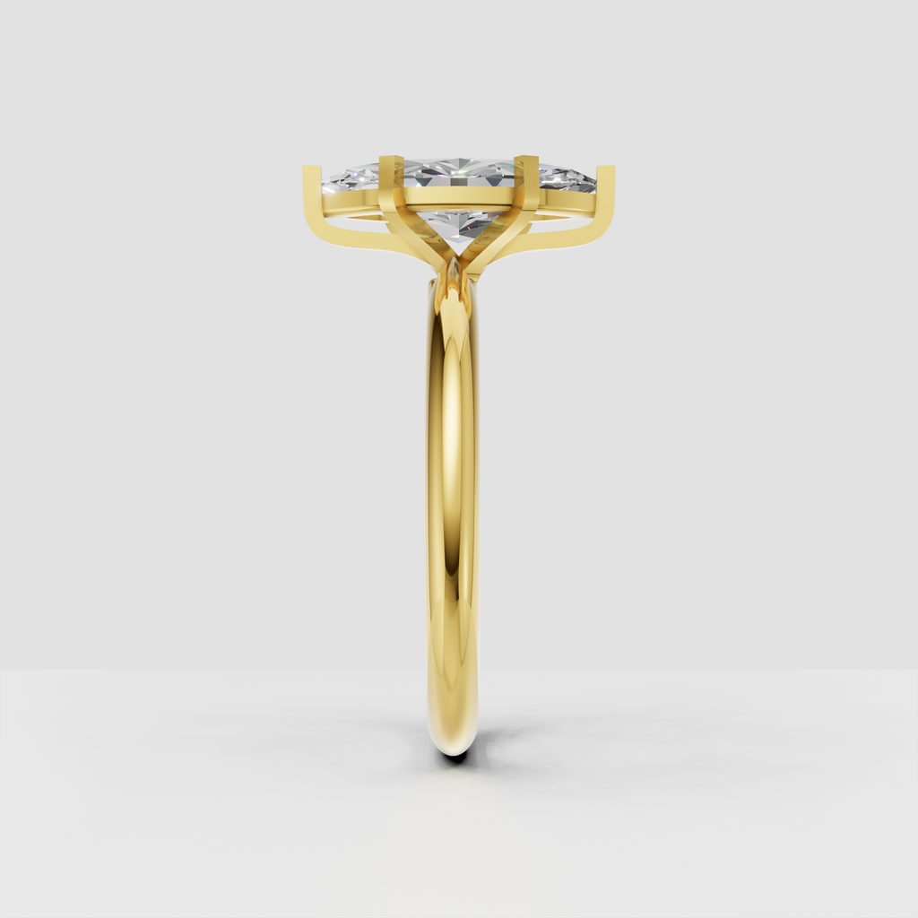 Yellow gold marquise cut diamond ring with elegant shared prong detailing