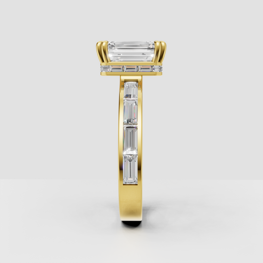 Yellow gold emerald cut engagement ring featuring channel-set baguette stones