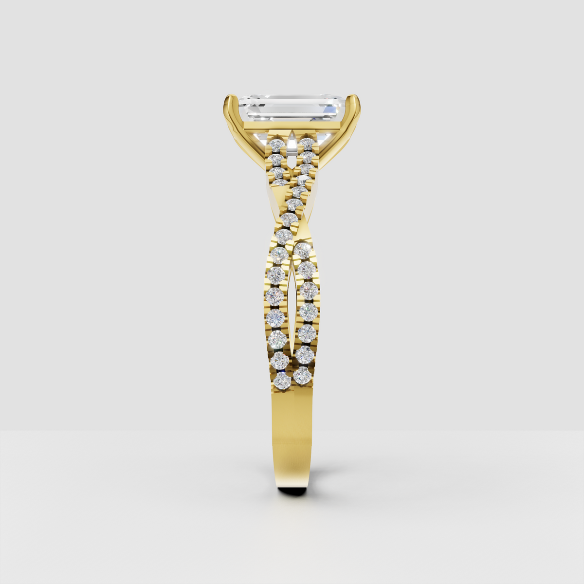 Emerald cut center diamond ring with pavé split shank