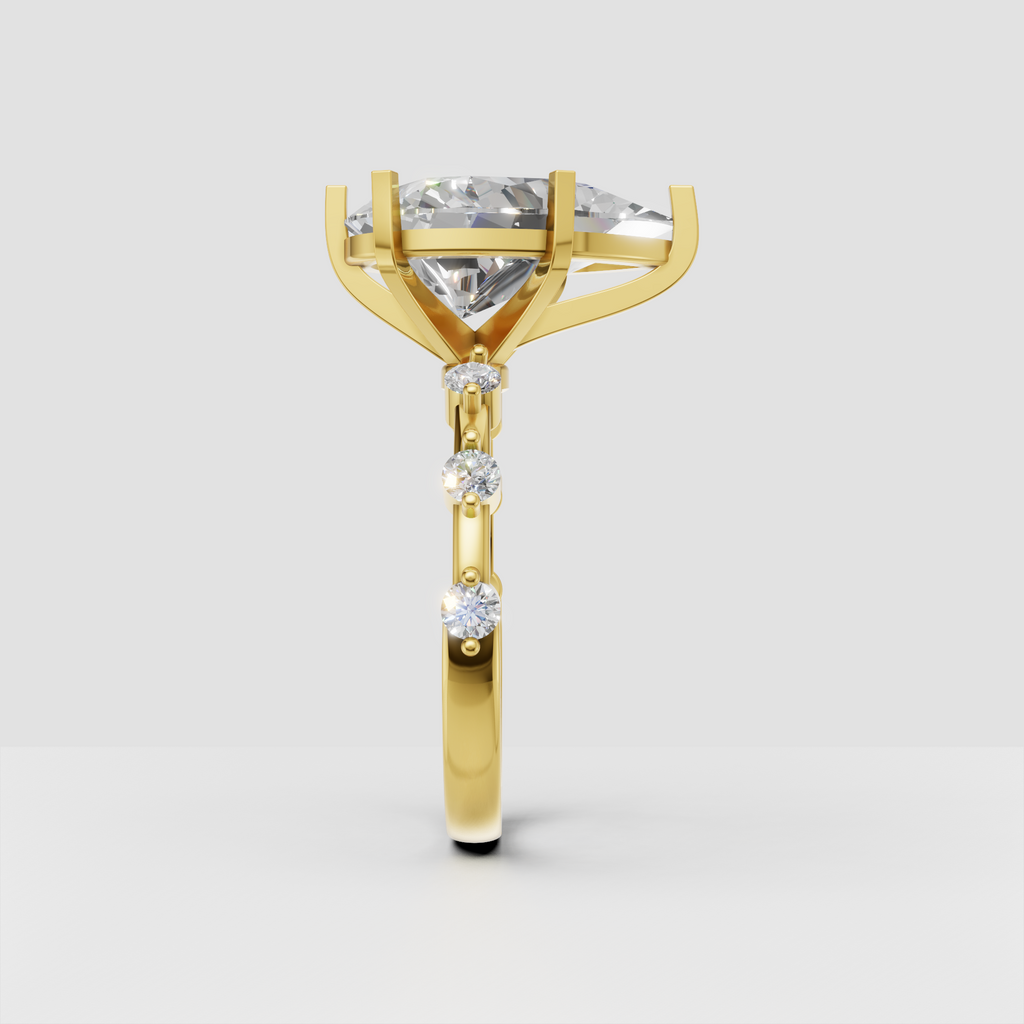 Pear cut diamond ring with elegant cathedral setting