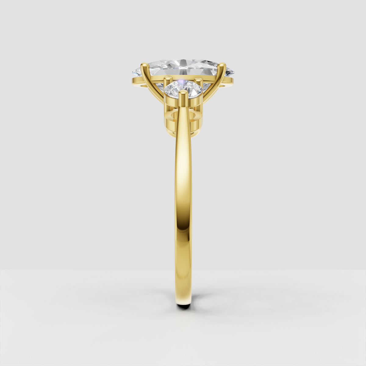 Elegant oval cut diamond ring with two side stones