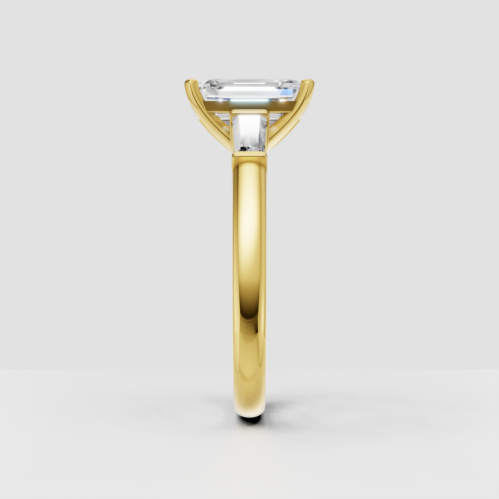 Luxury emerald cut solitaire engagement ring with baguette diamond accents