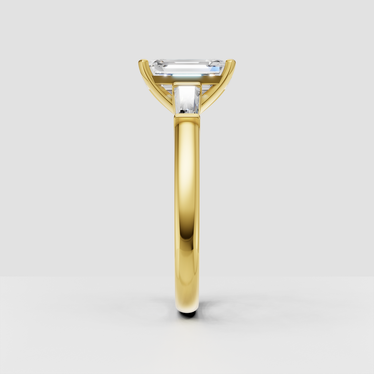 Luxury emerald cut solitaire engagement ring with baguette diamond accents
