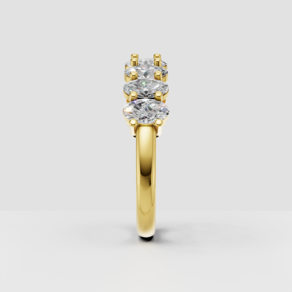 Full eternity band with oval-cut diamonds in a polished gold setting