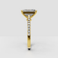 Elongated emerald cut diamond ring with pavé shoulders