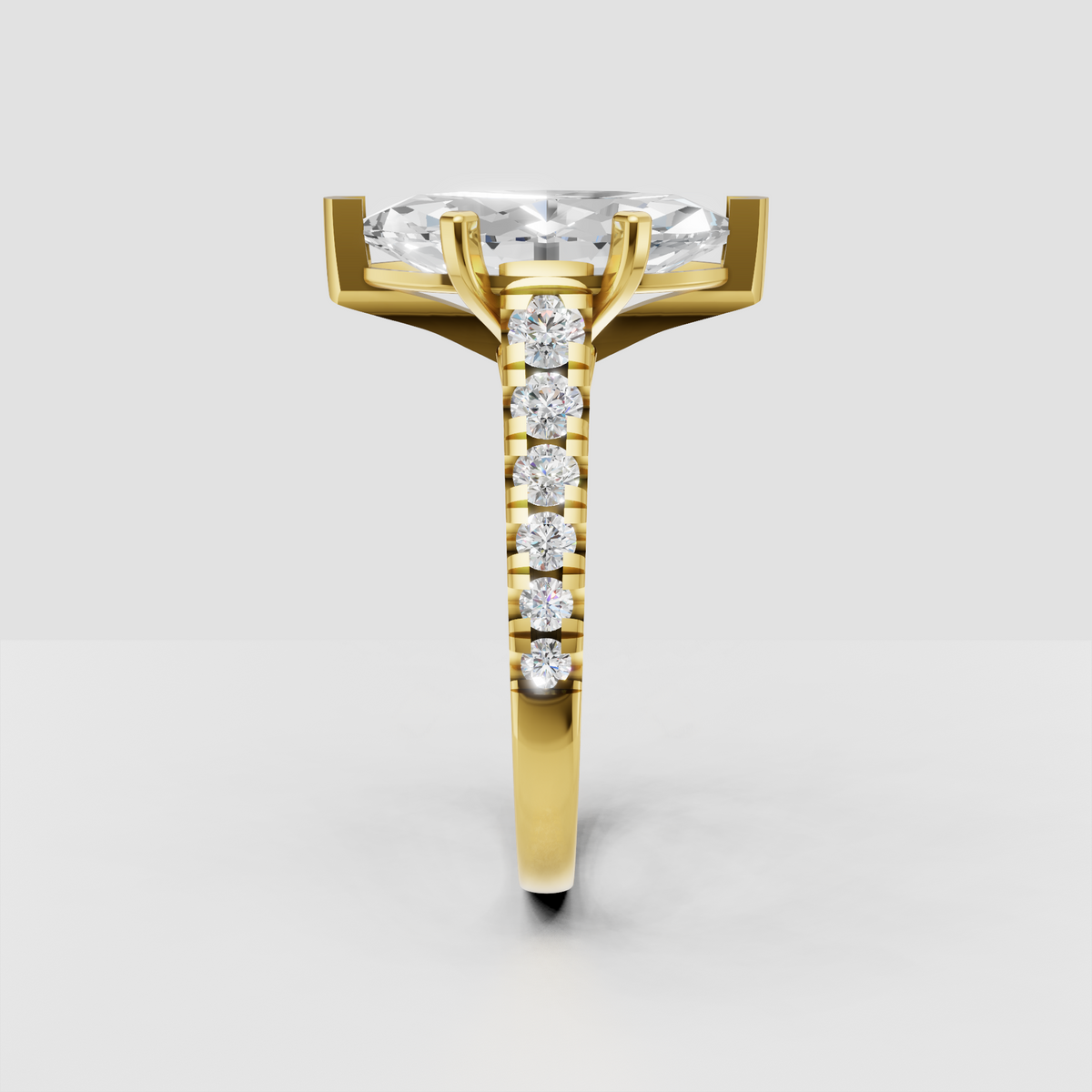 Yellow gold marquise cut diamond ring with cathedral-inspired pavé band