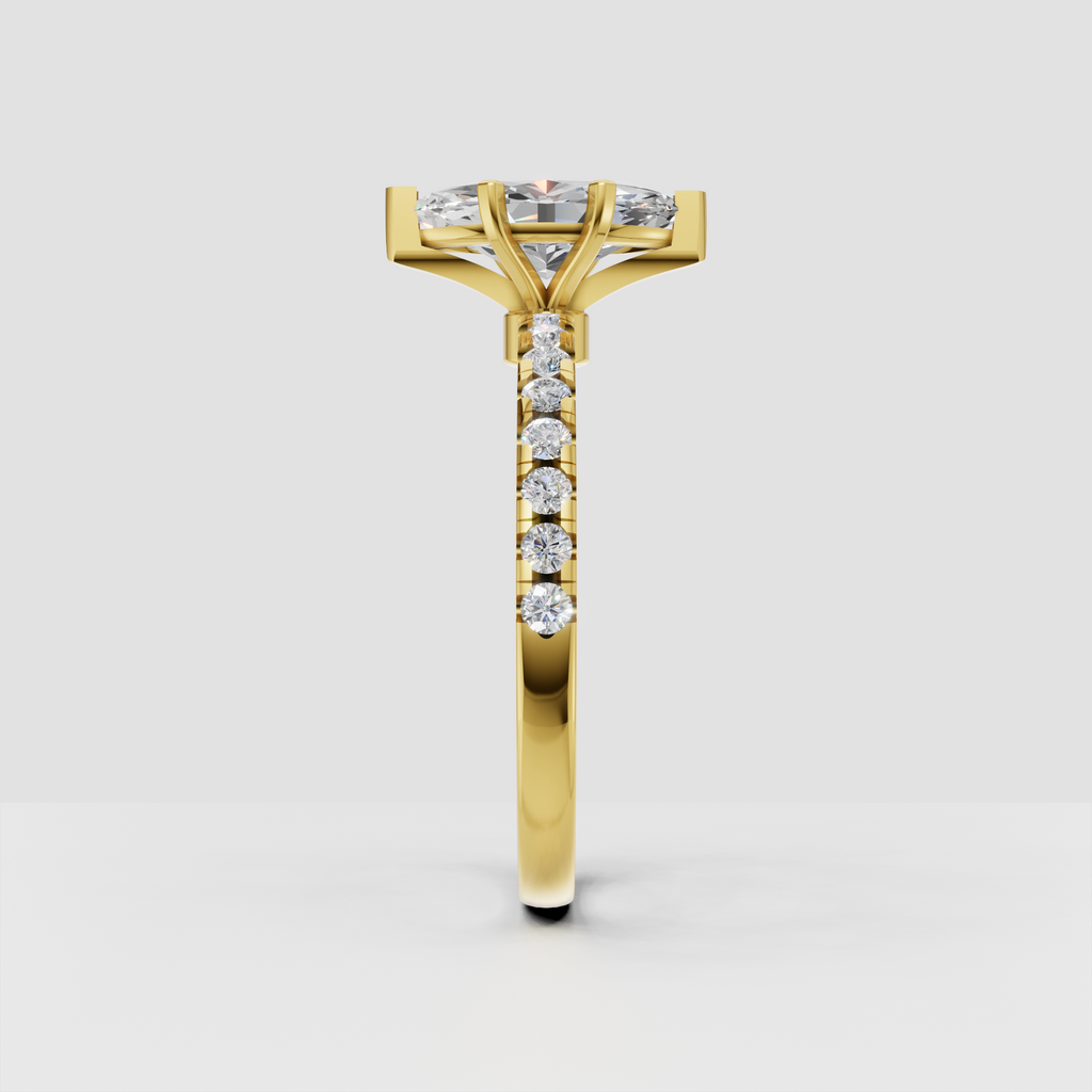 Yellow gold marquise diamond ring with four-prong setting