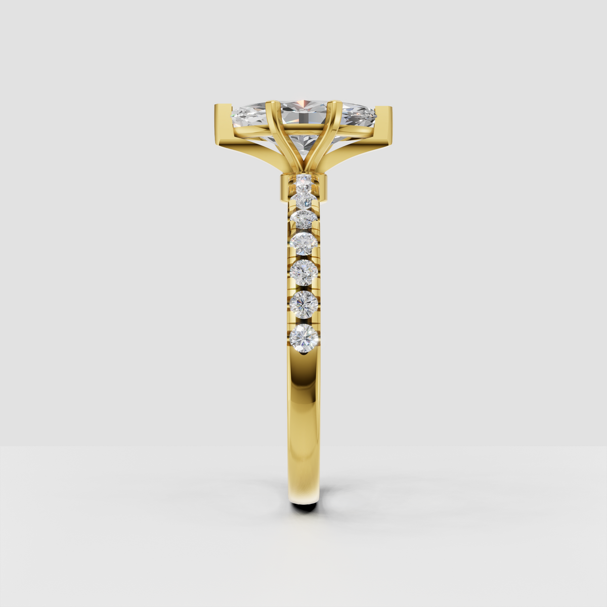Yellow gold marquise diamond ring with four-prong setting