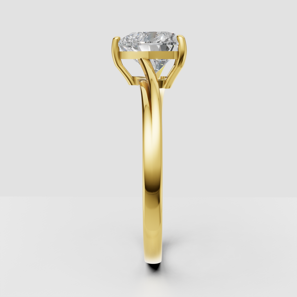 Heart cut solitaire engagement ring with elegant open gallery in yellow gold
