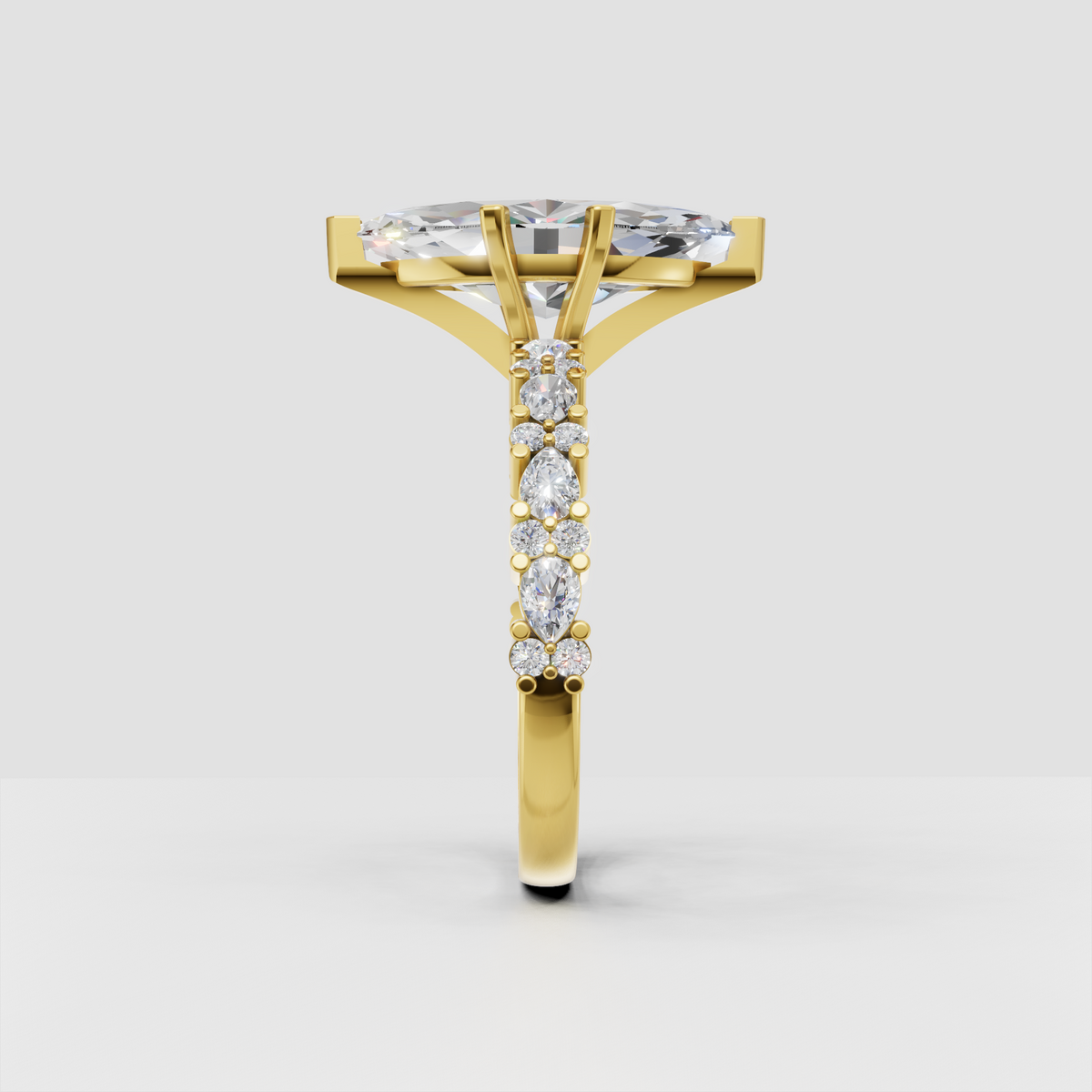 Marquise cut diamond ring featuring round and marquise side stones