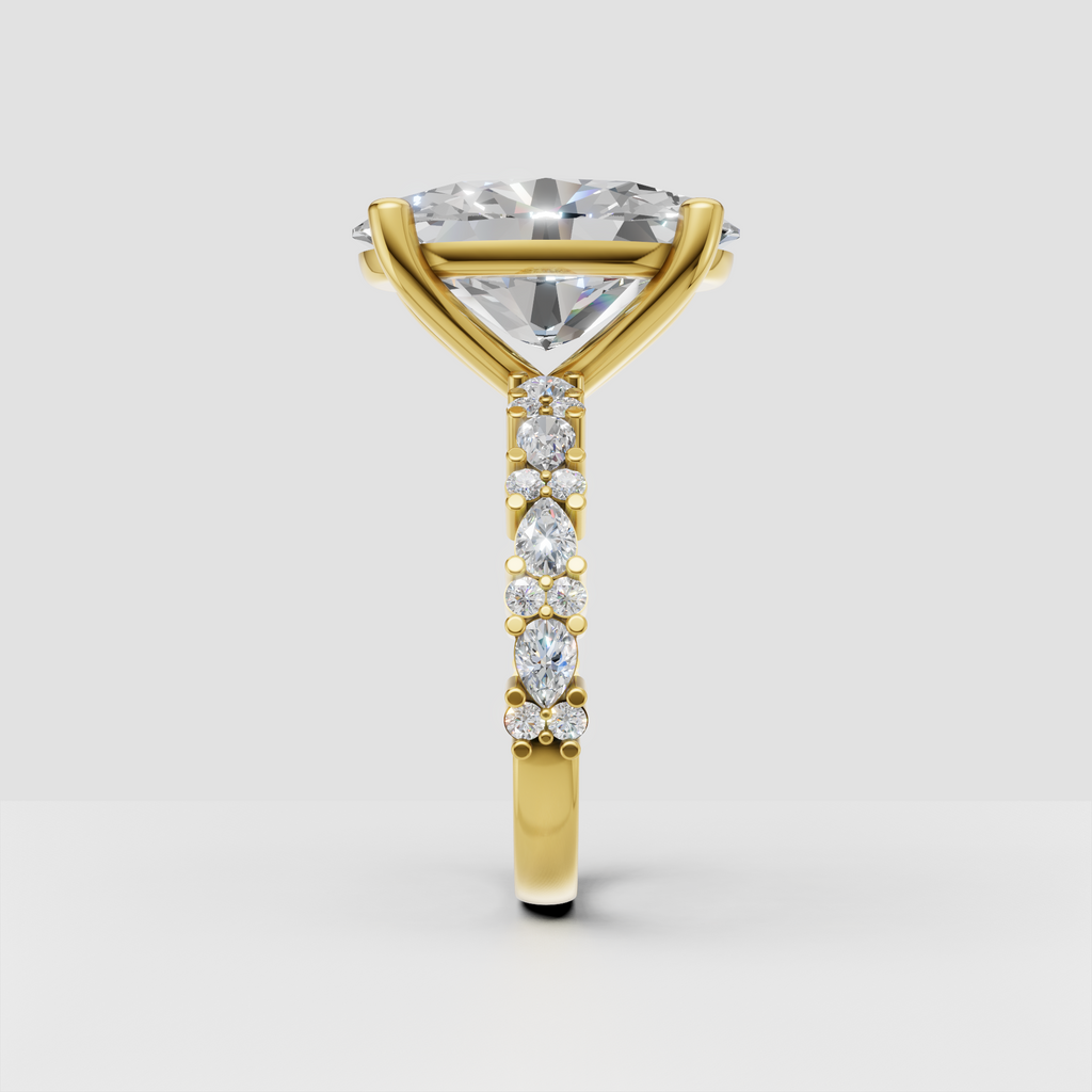 Yellow gold oval diamond engagement ring with side diamond detailing