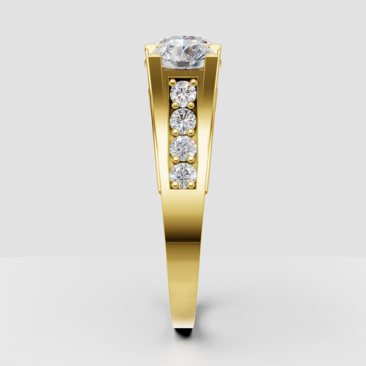 Yellow gold three-stone Diamond engagement ring with pavé shoulders