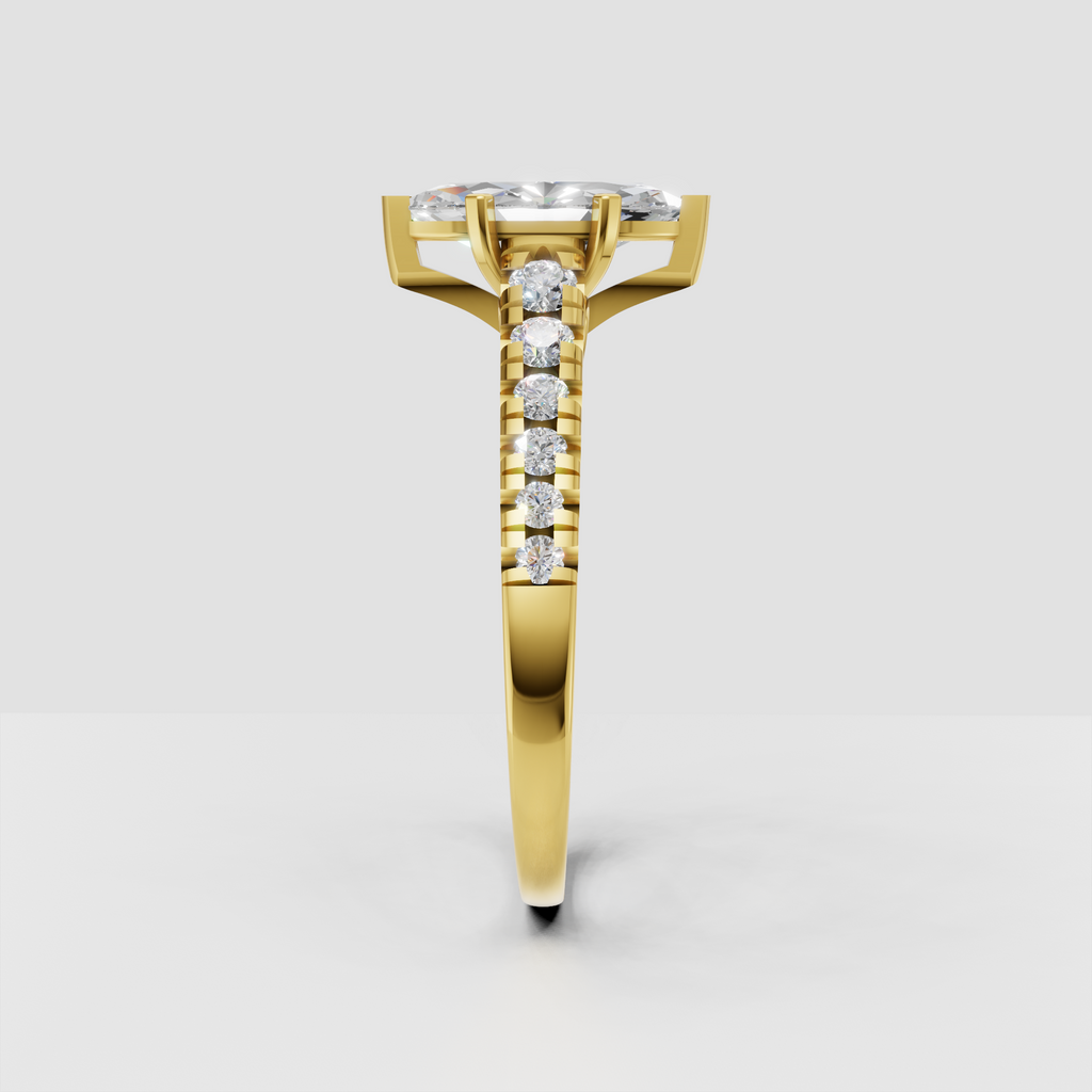 Yellow gold marquise diamond engagement ring with four-prong setting