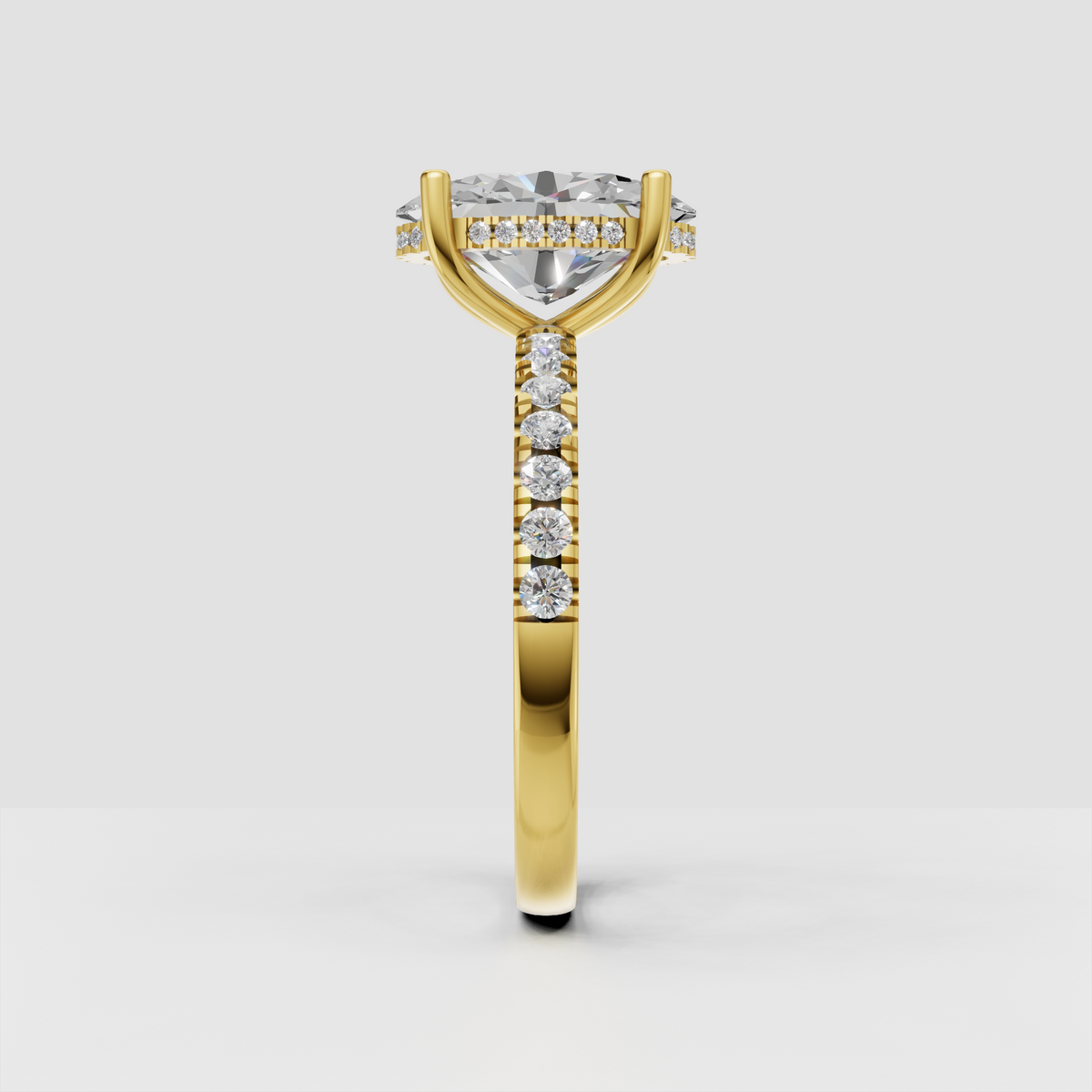 Oval hidden halo diamond ring in polished yellow gold