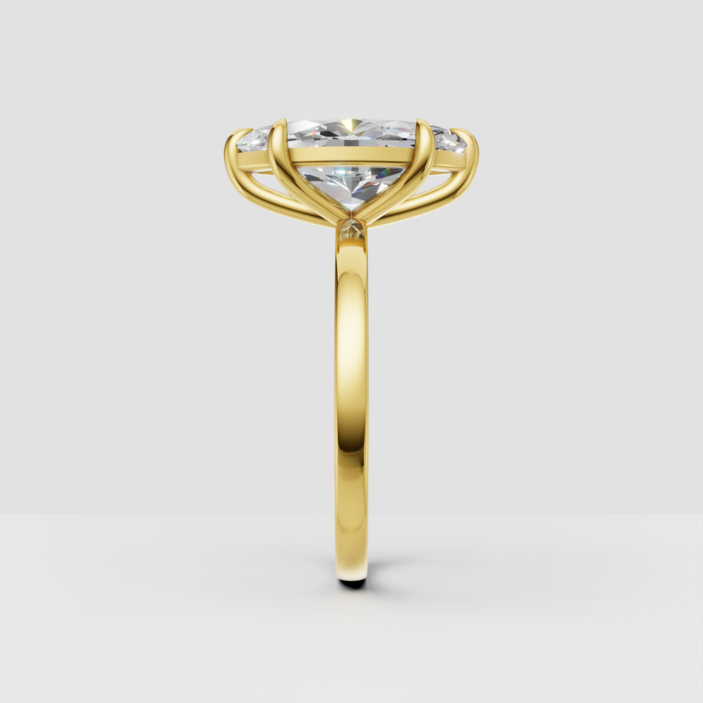 Yellow gold marquise cut diamond ring with polished band