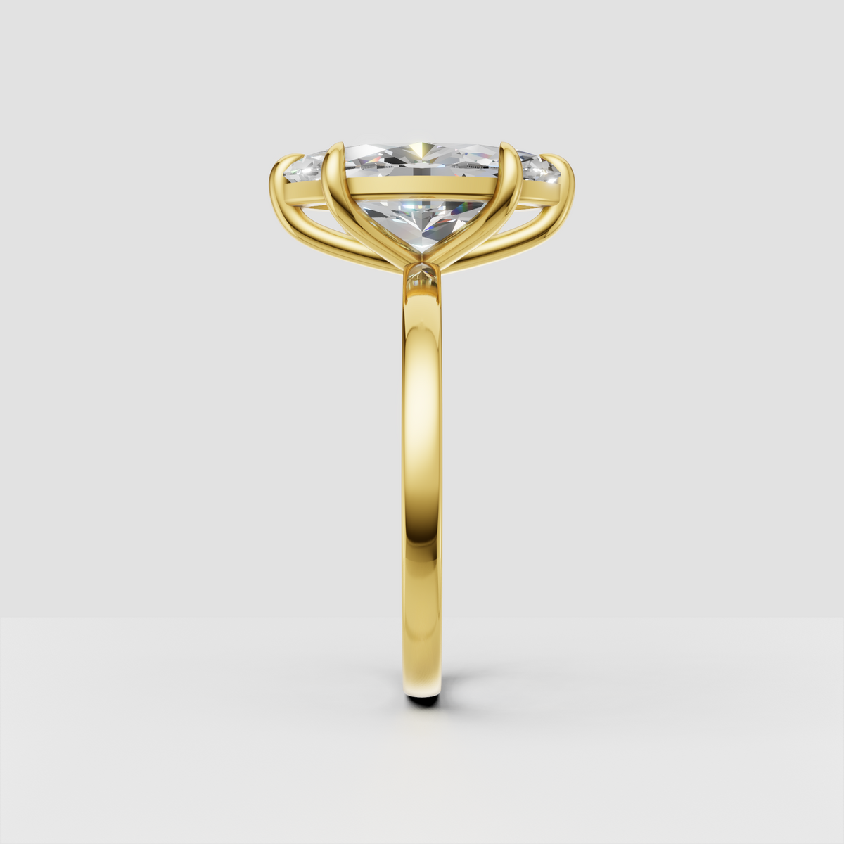 Yellow gold marquise cut diamond ring with polished band