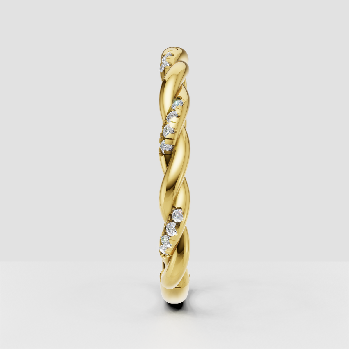 Interwoven round diamond band with pavé accents