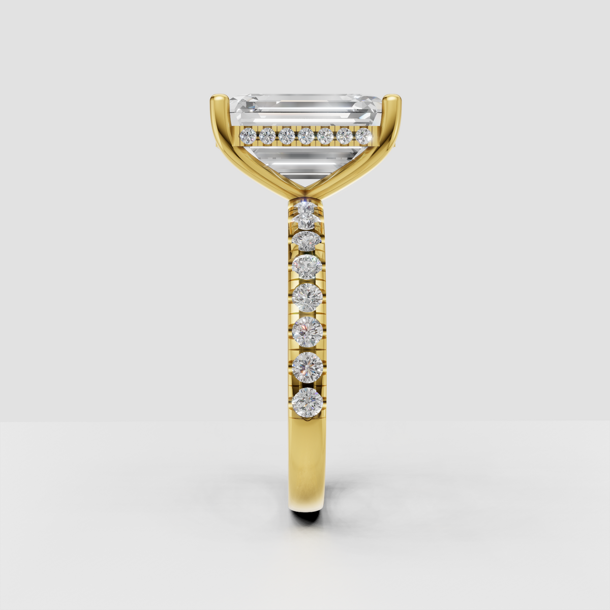 Yellow gold heart cut diamond solitaire ring with three prong setting