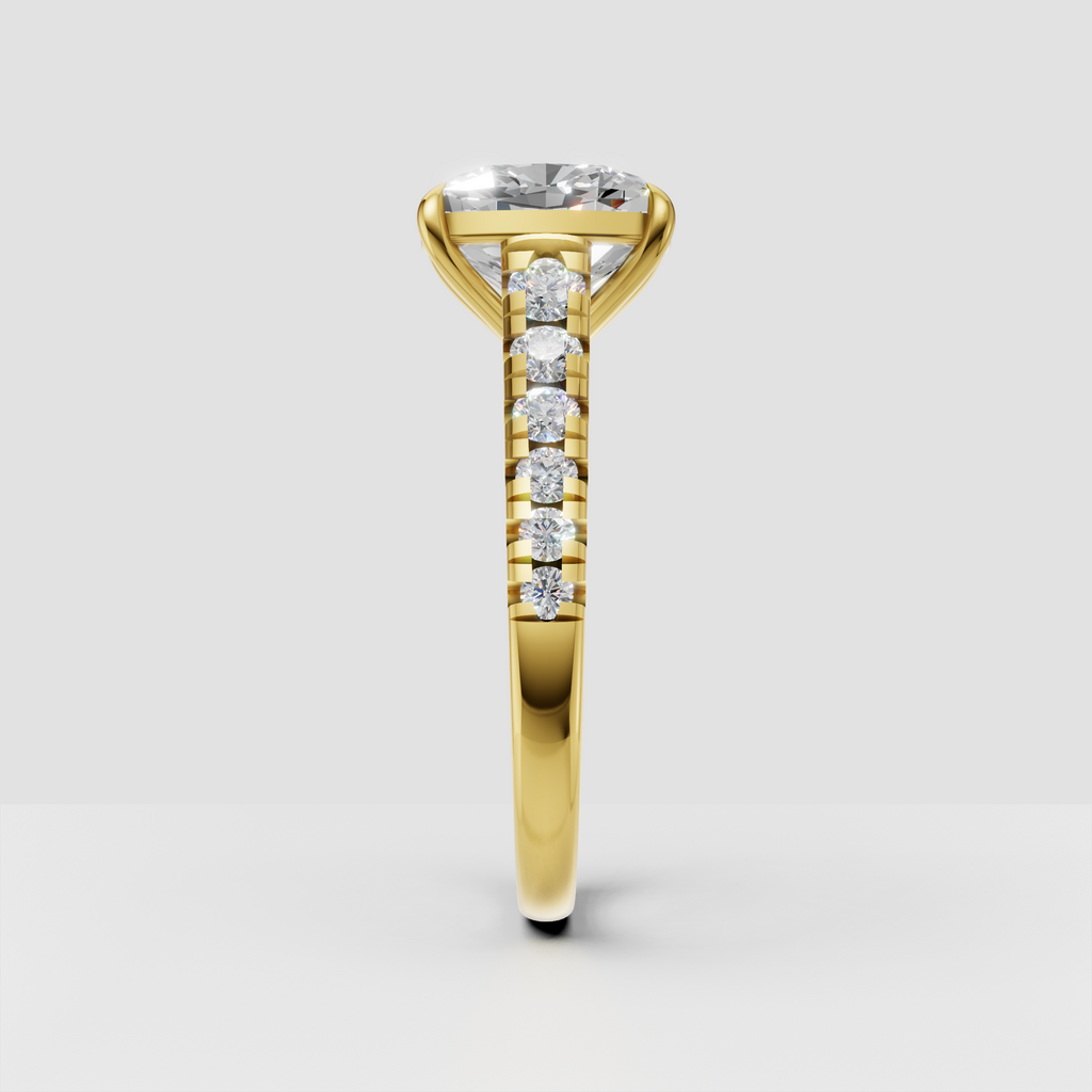 Yellow gold cushion diamond engagement ring with side stones