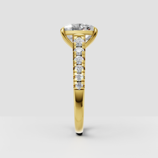 Yellow gold cushion diamond engagement ring with side stones